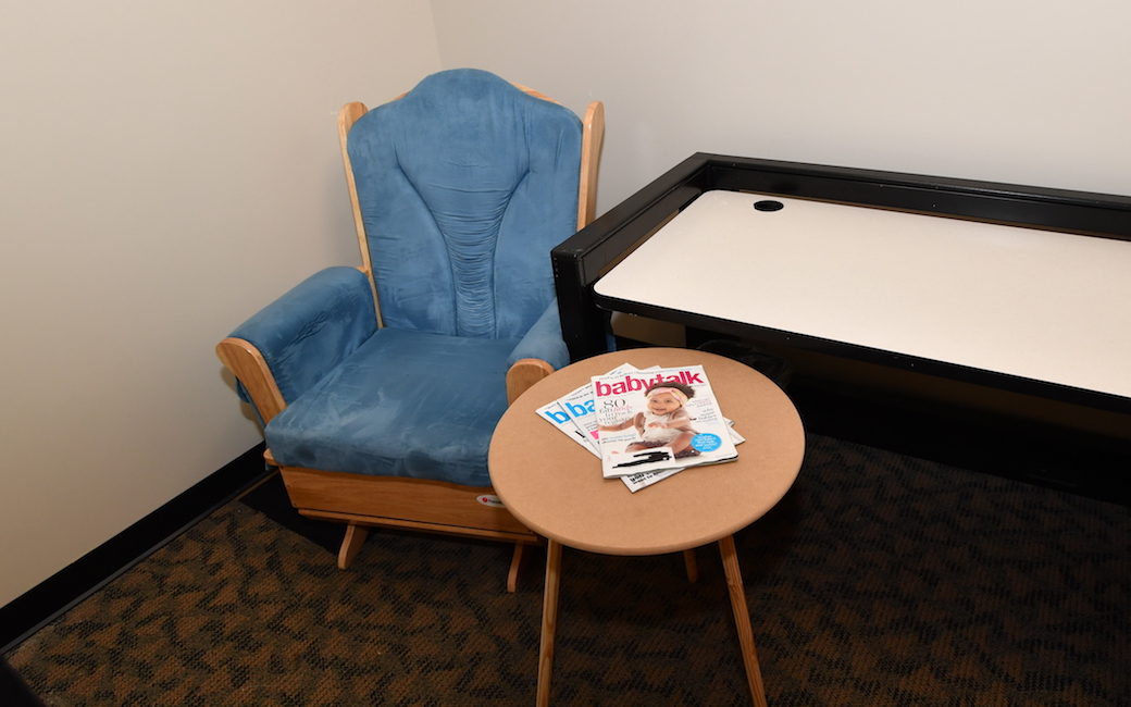 The nursing mothers' room in the Administration Building has a comfortable chair, outlets, a table and easy access to the restrooms.