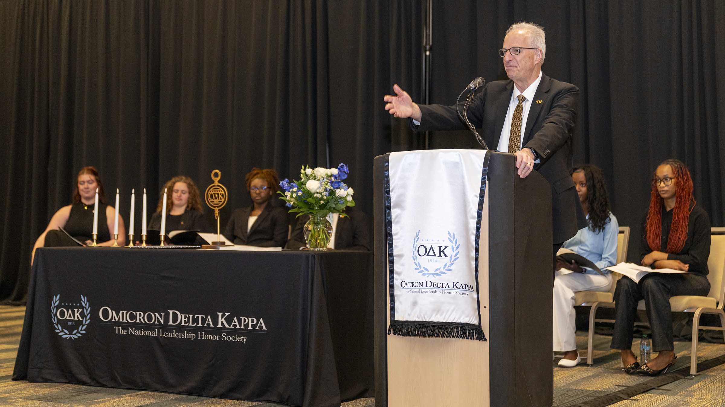 President Ginsberg speaking at the national leadership honor