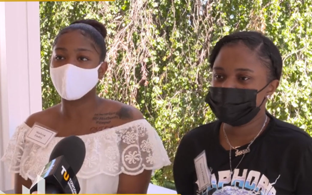 two students participating in the event