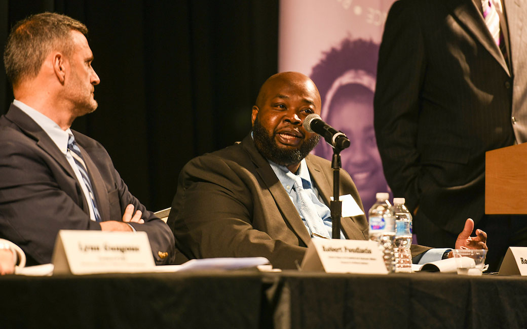 Teacher of the Year Rodney Robinson speaks during PDK Panel at Towson University