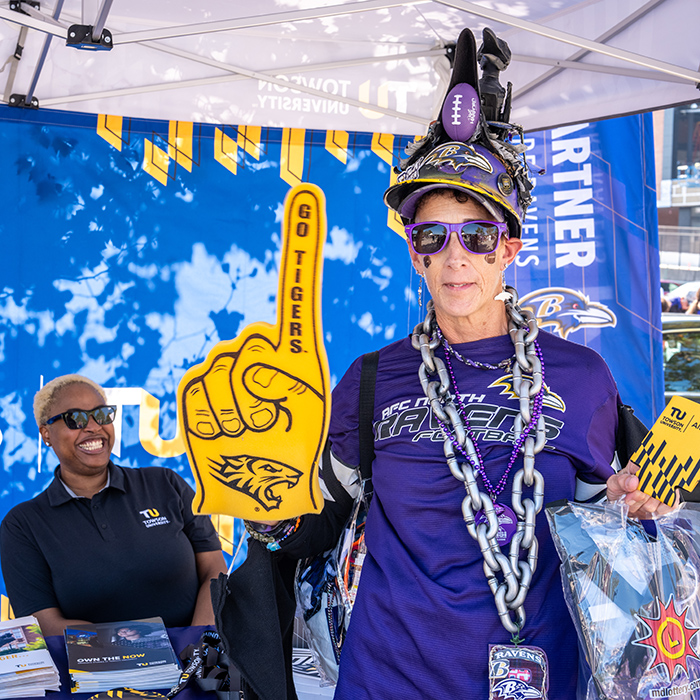 Ravens fan with TU foam finger