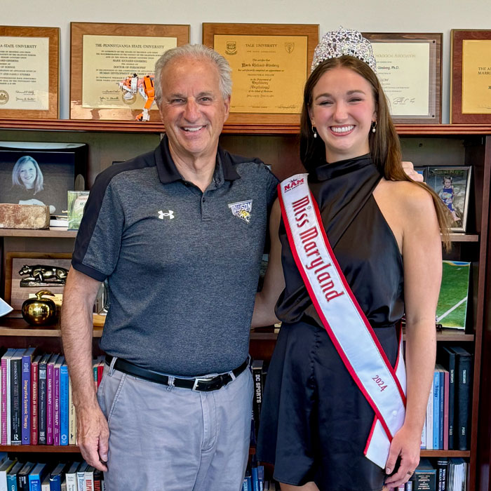 President Mark Ginsberg posing with former Miss Maryland, and TU Diver Sara ParksVold 