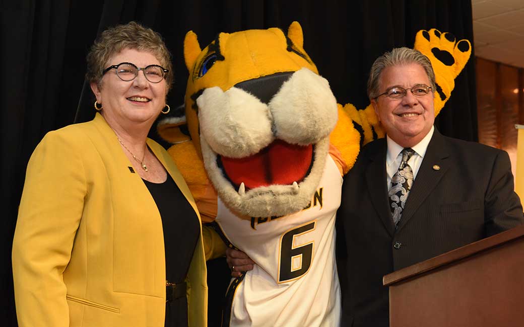 Incoming President Kim Schatzel at her welcoming party, pictured with USM Chancellor Robert L. Caret and Doc the Tiger