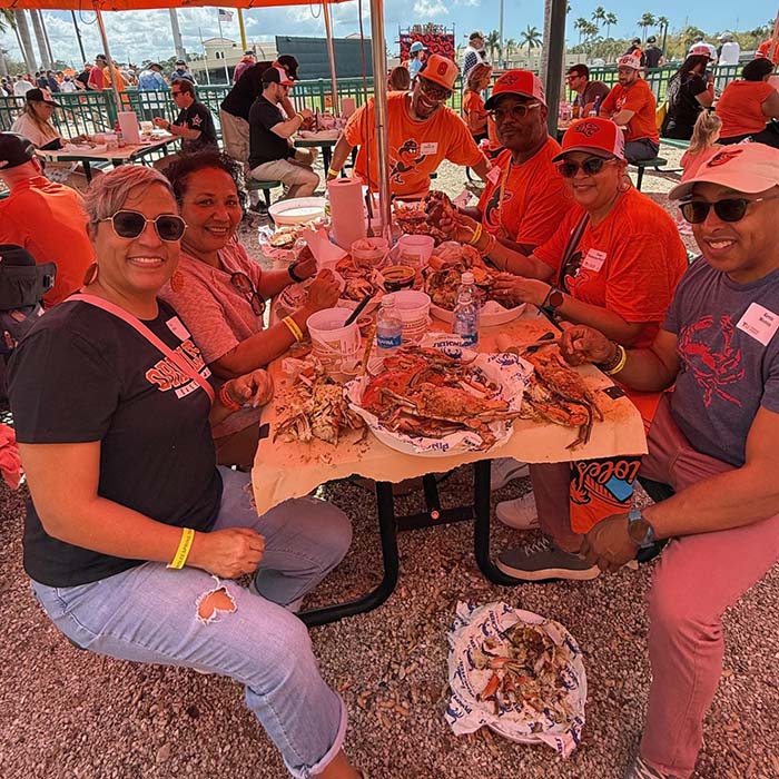 TU alumni eating a crab feast