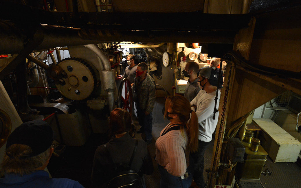 Students in the engine room of the S.S. John Brown