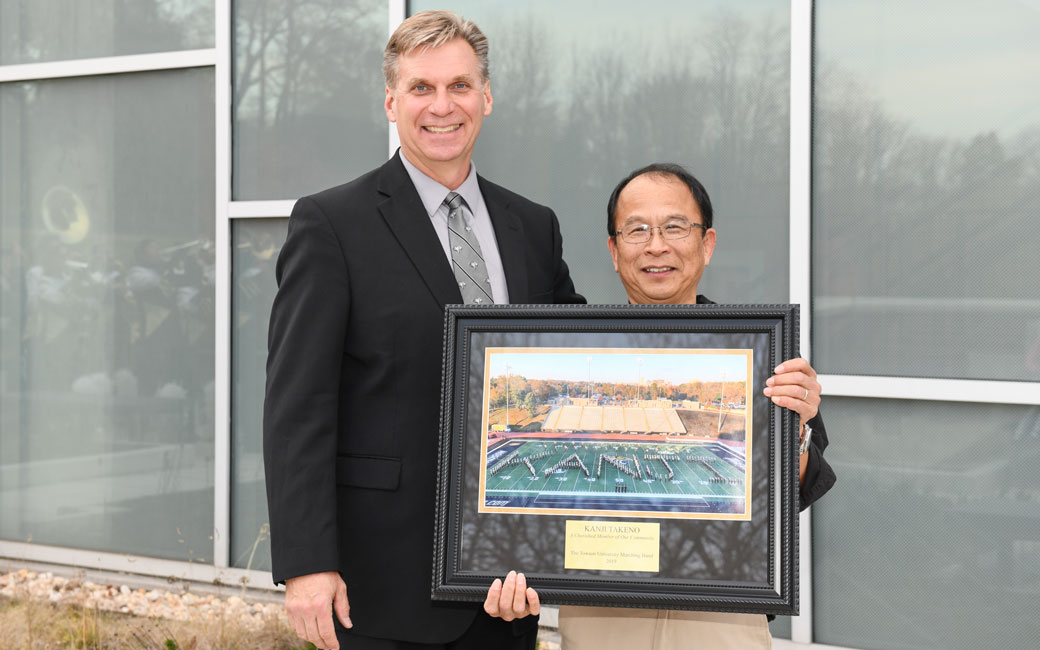 Kanji and John Miliauskas, Director of the Towson University Marching Band 