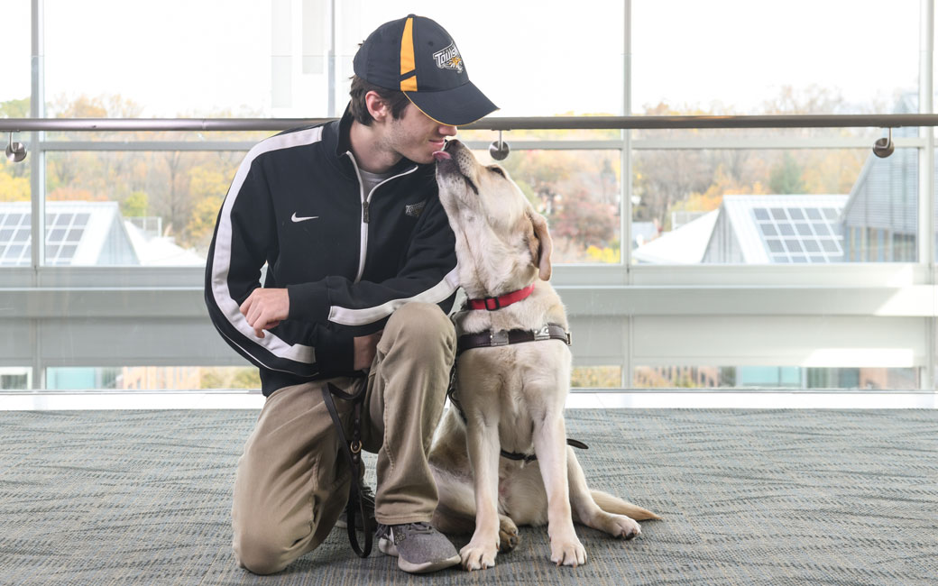 Tim Utzig and service dog Alisa