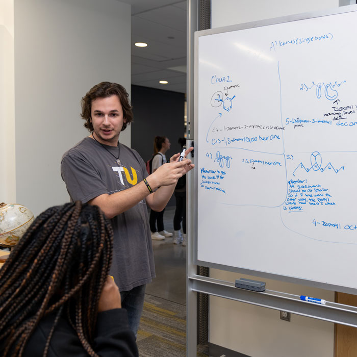 Student coaches a peer