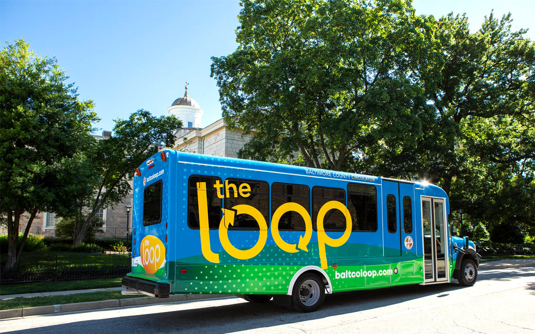 The Towson Loop shuttle pictured in front of the Baltimore County government building
