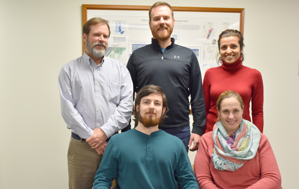 Members of Towson University's Center for GIS (CGIS) have helped develop Climate Impact Visualization tool designed to increase understanding of the progression, extent and impacts of coastal flooding related to storm surge. Members of the CGIS include: (Back Row) David Sides, Phil Reese and Newsha Amirihormozaki; (Front Row) Anthony Re and Ashley Buzzeo. 