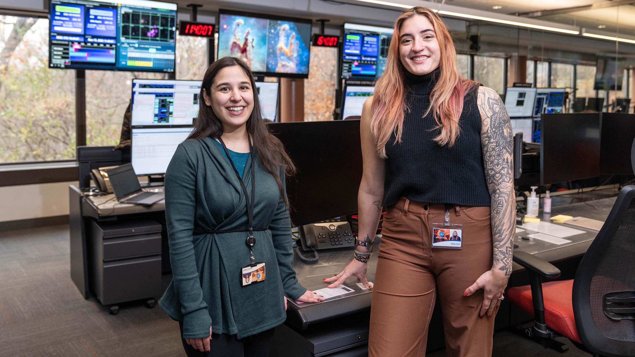 Alyssa Pagan and Kielan Hoch inside the James Webb Space Telecope Control Center