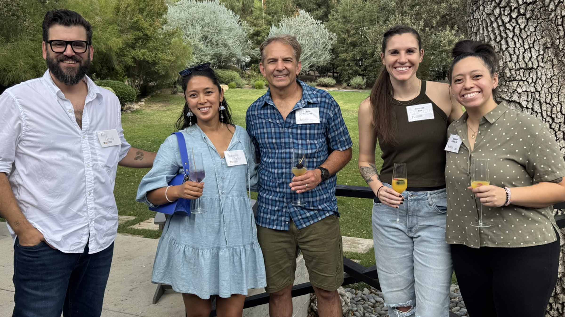 Alex Gradet ’98, Samantha Devlin, Chris Devlin ’90, Courtney Birk and Ashleigh Coffelt ’12