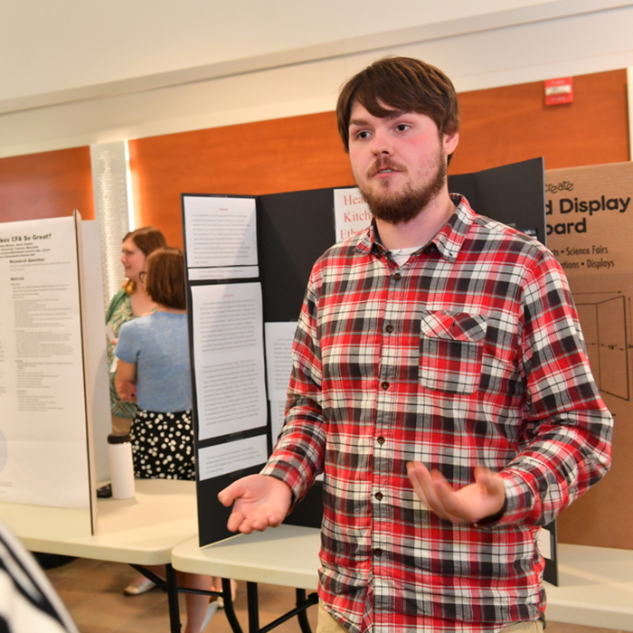 Communication Studies student presents his research