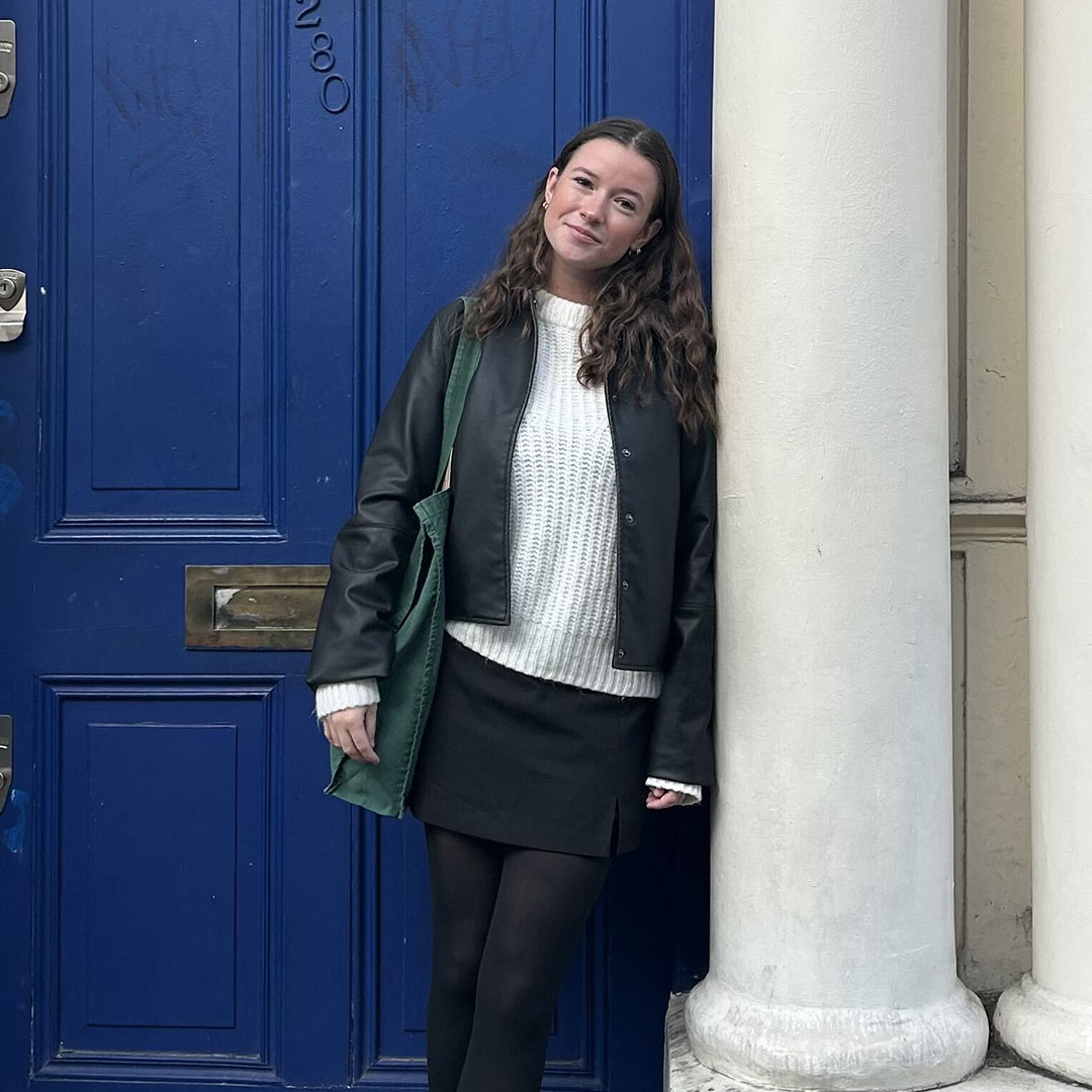 Amy Stiegler in front of blue door