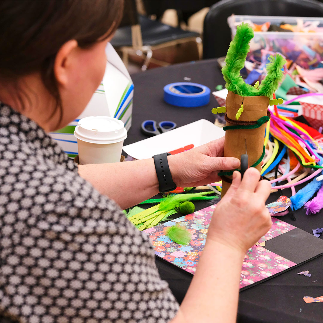 A person works on a craft.