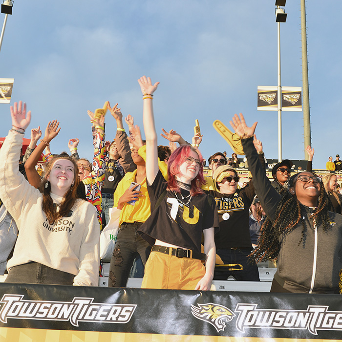 Students attending a Homecoming football game