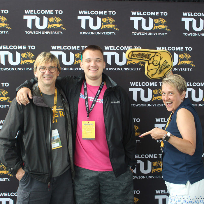 Family posing with TU props