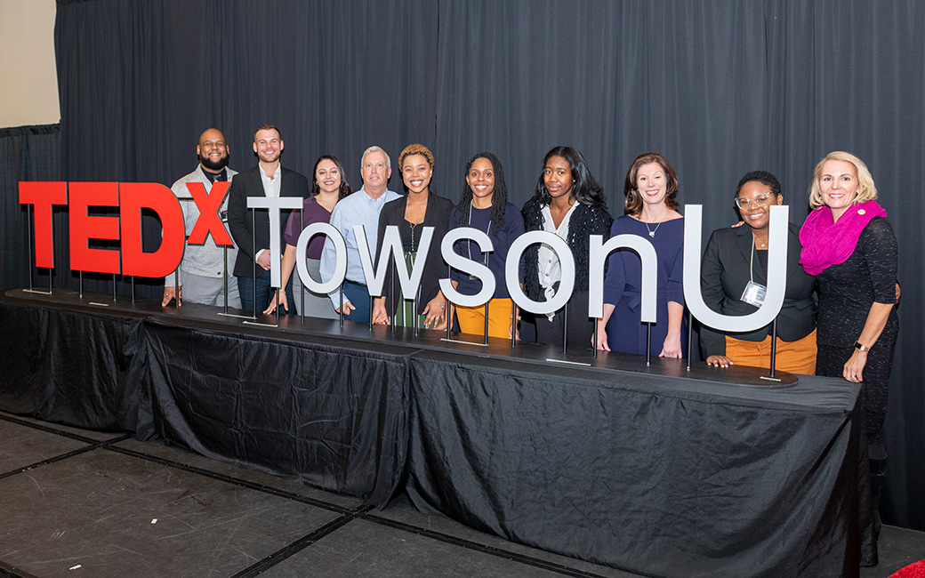 The TEDxTowsonU speaker team poses for a photo.