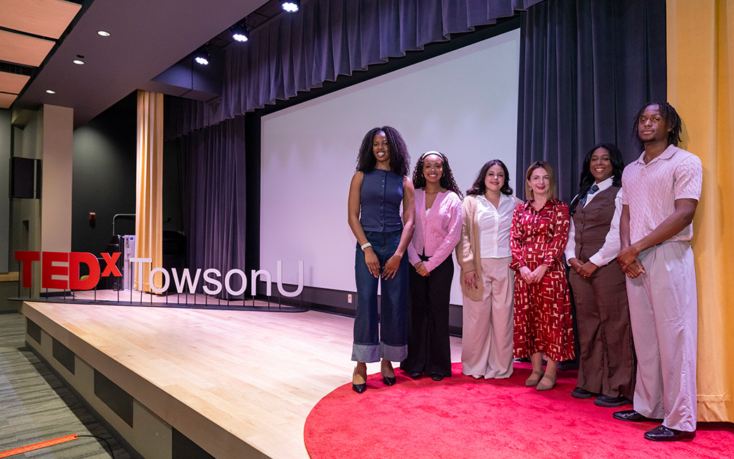 The TEDxTowsonU speaker team poses for a photo.