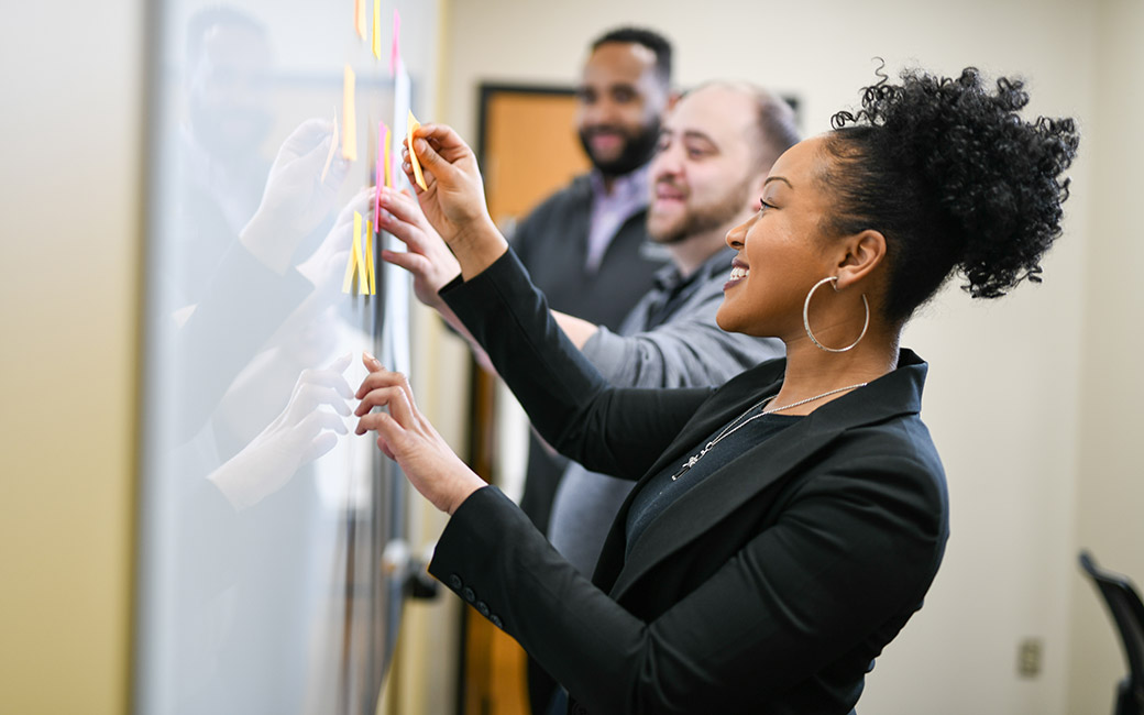 marketing team members plan together